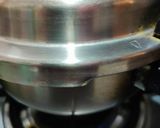 A picture of step 4 of Doodh daliya in pressure cooker (with different toppings).