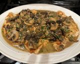 A picture of step 4 of Chicken Marsala.