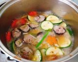 Hình bước làm 3 của món Canh bí ngòi nấu mọc