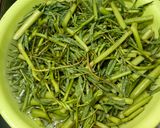 Hình bước làm 2 của món Canh Chua Nghêu Rau Nhút