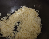 Foto del paso 5 de la receta: Arroz con almejas y langostinos al ajillo