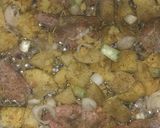 A picture of step 7 of Garlic and herbs roasted potatoes and chicken.