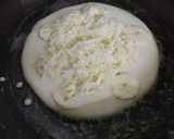 A picture of step 4 of Banana cheese stuffed pancake.