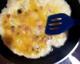 A picture of step 6 of French omelette.