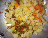 A picture of step 5 of Irish potato pot.