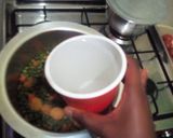 A picture of step 7 of Minji stew served with white rice.