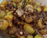A picture of step 10 of Lemon, coconut, imli, curd Rice.