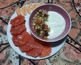 Une image de l'étape 5 de Yaourt au granola accompagné de pomélo et de mandarine 🥣.