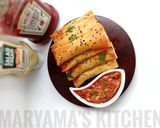 A picture of step 14 of Crunchy chicken filo cigars.