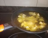 Foto del paso 4 de la receta: Chipirones al ajillo con patatas