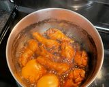 A picture of step 3 of Coca cola braised chicken wings.