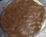 A picture of step 9 of Swiss roll tutti frutti cookies.