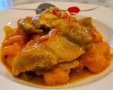 Foto del paso 8 de la receta Jamoncitos de pollo guisados con boniato y tomate