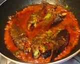 A picture of step 9 of Bengali: Koii Machher Tel-Jhal.