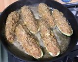 Une image de l'étape 20 de Courgettes farcies carotte jambon emmental.