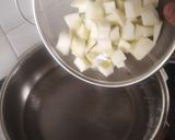 A picture of step 1 of Chatpati Kachi Keri Chuski.