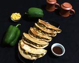 A picture of step 15 of Capsicum Corn stuffed Wheat Flour Tacos.
