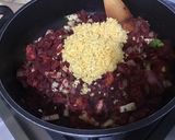 Une image de l'étape 14 de Dahl de lentilles jaunes aux carottes violettes, tomates et courgette.