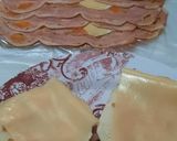 Foto del paso 5 de la receta: Sándwich raspado con ajo, cherry, oliva y matambre