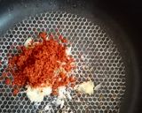 A picture of step 2 of Tandoori chicken rolls up.