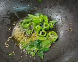 A picture of step 4 of Kaju Karela.