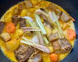 A picture of step 5 of Vegetable and Mushroom Curry.