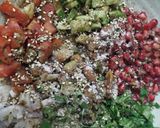 A picture of step 4 of Healthy Makhaana Salad with fruits veggies and nuts.