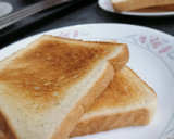 A picture of step 4 of Toast and peanut butter.