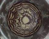 A picture of step 11 of Chocolate vanilla marbal cake.