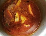 A picture of step 6 of Fried fish with fish curry.