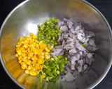 A picture of step 1 of Crispy Corn, Bell Pepper, and Onion Fritters.