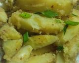 A picture of step 7 of Garlic buttery potato wedges.
