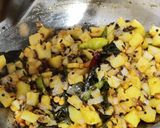 A picture of step 3 of Daliya upma (Broken wheat upma).