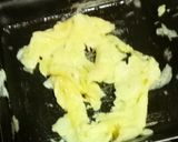 A picture of step 1 of Cheesy Scrambled Egg Sandwich With Black Tea.