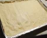 Foto del paso 4 de la receta: Pizza de alcachofa y langostinos