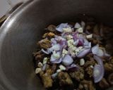 A picture of step 2 of Mutton stew with deep fried potatoes.