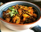A picture of step 6 of Chingri Pui Metuli (Malabar Spinach Seeds Curry with Prawns).