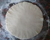A picture of step 9 of Jollad Rotti (Badnekayi and chaulikai palle).