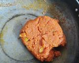 A picture of step 3 of Gajar ka halwa sushi roll with rabri cream cheese filling.