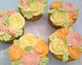 A picture of step 3 of Vanilla cup cake with butter icing.