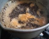 A picture of step 2 of Masala milk tea with spring onion pakoda.
