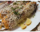 A picture of step 6 of Grilled Mexican Street Corn (Elote).