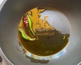A picture of step 3 of Kancha Aam diye Tok Dal (Raw Mango in Masoor Dal).