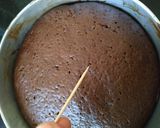 A picture of step 8 of Eggless Layered chocolate strawberry orange cake.