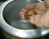A picture of step 1 of Birayani  With  Dry  Fruits  In  Pressure Cooker.