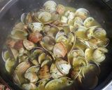 Foto del paso 11 de la receta: Almejas en salsa de perejil, ajos y jengibre fresco