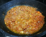Foto del paso 14 de la receta: Pimientos rellenos con bacalao y arroz sobre salsa de tomate
