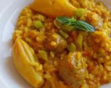 Foto del paso 9 de la receta Arroz meloso de calamar y butifarra