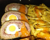 Foto del paso 7 de la receta: Rollo de carne picada relleno en salsa