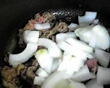 A picture of step 2 of Braised Beef with Tomato Sauce.